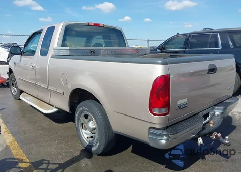 1997 Ford F-150 Lariat/Standard/Xl/Xlt z USA, uszkodzony, nr VIN 1FTDX1768VNC28285